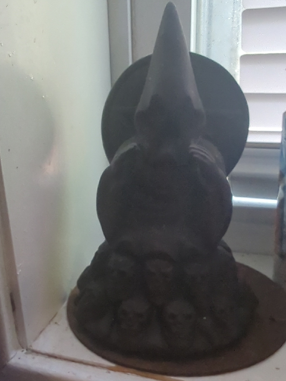 Handcrafted Dark Brown Gnome Figurine with Decorative Round Base